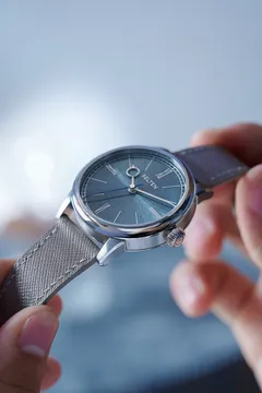 Selten Grand Feu Enamel Flare Moonstone, held in hand