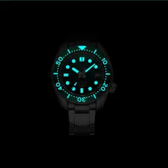 Addiesdive H7 lume shot, dial plots, hands and bezel scale glowing blue