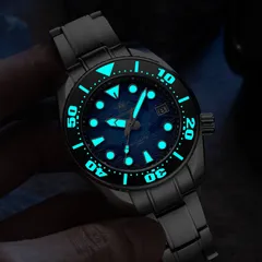 Addiesdive AD2102 lume shot, dial and bezel numerals glowing blue