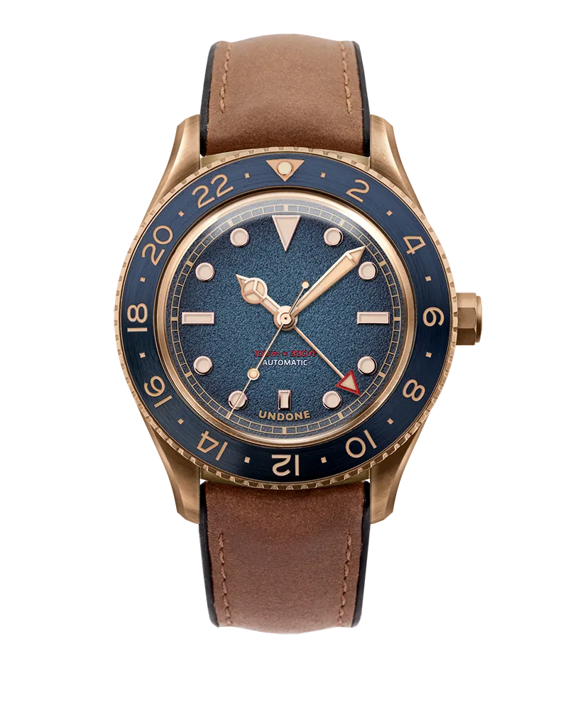 Undone Basecamp Quest with bronze case, blue dial and blue 24-hour bezel on a brown strap