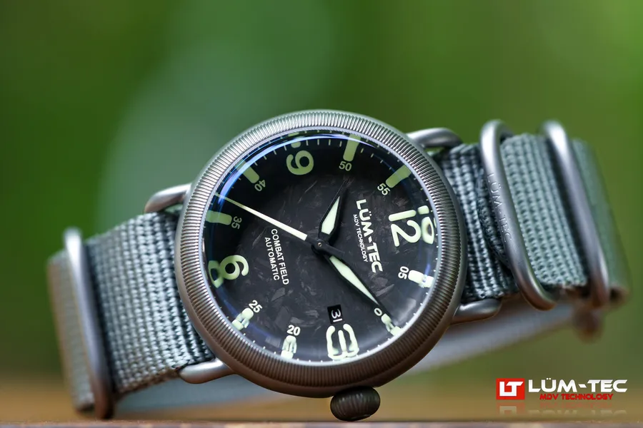 Lüm-Tec Combat Field X4 Titanium, forged carbon dial, on a grey nylon strap