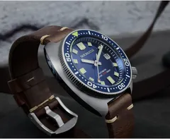 San Martin SN047-G with blue sunburst dial and applied SANMARTIN logo on brown leather strap