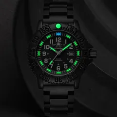 Addiesdive 050S in the dark, the tubes in markers and hands and the bezel pip glowing green