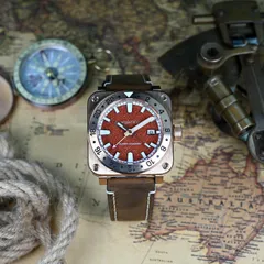 Aquatico Super Charger Bronze GMT with red aventurine dial, on brown leather strap