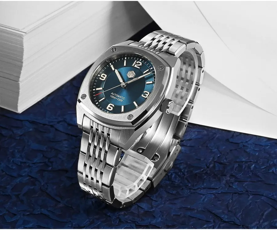 San Martin SN026-G with blue sunray dial and applied 12-3-6-9 numerals on nine-link bracelet