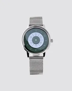 Anicorn Series K452 Eden with phthalo-green discs on a steel Milanese bracelet