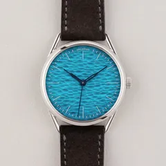 anOrdain Model 3 Method Aqua, rippled aqua-blue vitreous enamel dial with blued hands, on grey suede strap