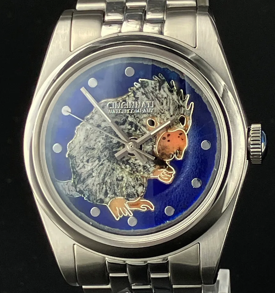 Cincinnati Watch Company Rico the Porcupine, cloisonné enamel porcupine on a blue enamel dial, on a five-link bracelet