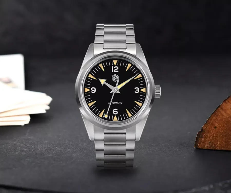 San Martin SN0113-G 38mm with matte black 3-6-9-12 dial and arrow hands on three-link bracelet