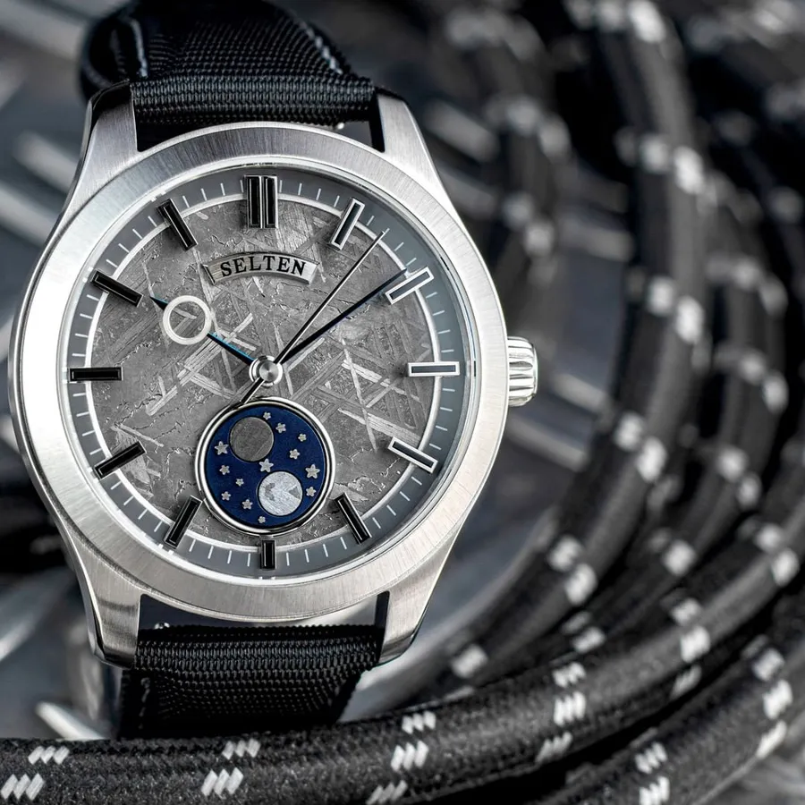 Selten 00.00 Natural Meteorite, meteorite dial with day and night indicator at 6, on black strap