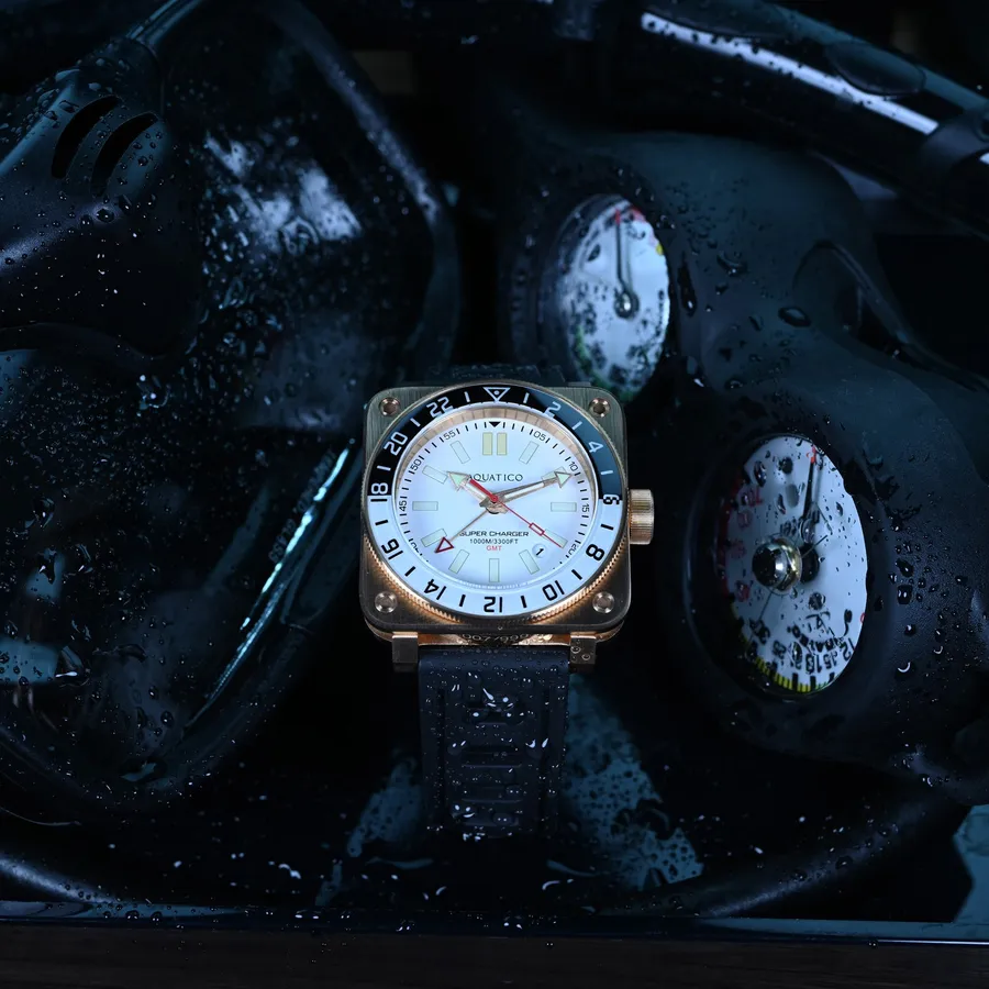 Aquatico Super Charger Bronze GMT with white dial, tritium tubes and black and white 24-hour bezel, on black rubber strap