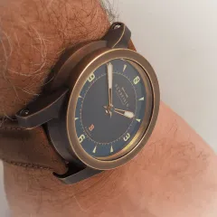 Schofield B3 in patinated bronze on the wrist