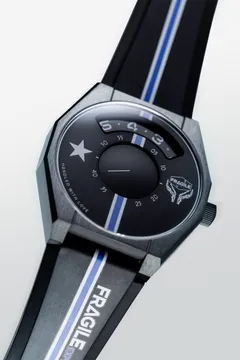 Death Stranding x Anicorn Fragile Express Time in black with the Fragile Express logo and a blue-striped strap