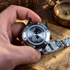 Aquatico Sea Star GMT solid screw-down caseback with globe engraving